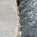 The concrete riverside deck area, below the dam has seen wear and is falling apart along Huron River on Wednesday, March 6, 2013. Melanie Maxwell I AnnArbor.com